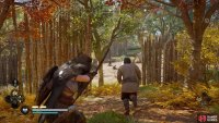 Before the man reaches the camp, take out a few of the murderers using your bow
