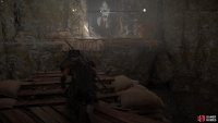 Follow the chasm until you spot a giant banner hanging over an archway