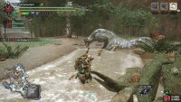 Tobi looks sideways, its head near the ground.