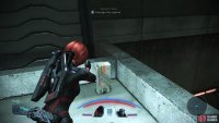 After defeating the enemies in the garage, loot your way to an elevator.
