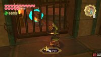 Yank the grounded Peahat on the other side of the gate with your whip.