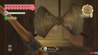 While the fan is in the present era, stand on the floor switch and shoot an arrow through it to the switch on the opposite side.