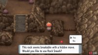 Face the cracked rock and press the A button.