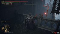 Turn left at the end and jump over the balcony. Defeat the Sorcerers, head up the stairs, and turn left again.