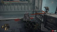 Continue along the path and go around the edge of the next tower.