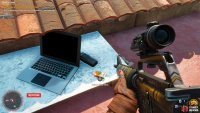 to find the usb sitting containing Dinero sitting next to a laptop on a roof. 