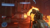 Interact with the terminal to reveal the power generator, then shoot it to destroy it.