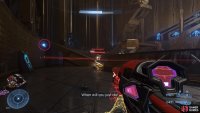 Shoot the Harbinger from afar as you bring down her shield to get a good visual on when blue energy balls are conjured, circled here in red.