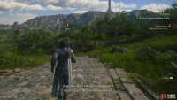 Follow the road into town.
