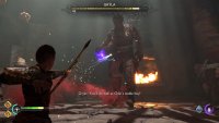 You need to shoot the exposed cauldron whenever you see the purple light from it.