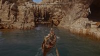 Row through the hole in the rock here.