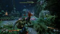The Hateful in The Abandoned Village is surrounded by lesser Draugr in a glade of rock and trees.