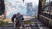 Once you grapple across this area and onto a wooden platform