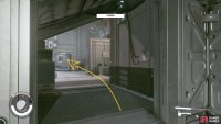 Cross the enemy-filled room slowly to head towards the Research Director’s Office