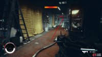To your right, follow the red hallway up the stairs, then up the following stairs.