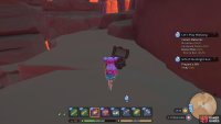 The chest will be sitting under a noticeable blue building.
