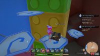 The first chest in Catori World is located on the steps of the toy clock tower.