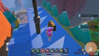The next chest is located on top of the toy clock tower.
