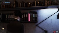 Snatch the pink file on the shelves to the left of Jara Drory’s computer