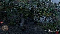 Hiding behind a barricade in the hills side. You need to dismantle it.