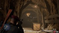 A short way down the tunnel you will be able to pick off the single guard lurking in the darkness.
