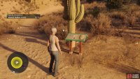 a fourth sign can be found near a cactus in the desert just south of the parking lot,