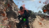 A teammate tries to revive a fallen soldier but is shot in the back for his troubles.