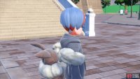 We have to ask where she got the Eevee bag from… (Credit: The Pokémon Company)