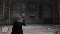 Head into the Great Hall, then look for a Moth Mirror on the right.