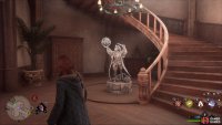 Use Levioso on the statue at the bottom of the stairs to extract the page.