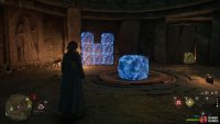 You need to use Wingardium Leviosa to move the rock and fit it with the others, with the arrow facing down. 