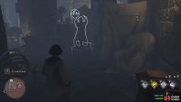 You’ll find the statue at the bottom of the stairs.