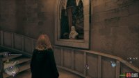 Part way up the Ravenclaw Tower’s Spire is a bust. Ravenclaw players get this during the tutorial.