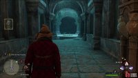 Head down the spiral staircase and the hallway to reach the Map Chamber doors.