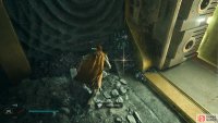Pick up the treasure near the door.
