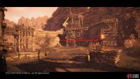 Run through the area until you reach an open gate with a yellow flag next to it.