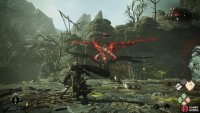 You’ll need to deflect the red beam attacks to briefly stun the Suanyu.