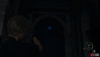 to find the first medallion hanging on the wall to the left of the gate.