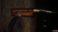 The W-870 Shotgun can be found hanging on the wall at the top of the stairs.