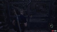 Go to the gates outside the manor to use the Insignia Key. 