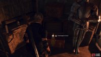 Open up the treasure chest to the left of the fire.