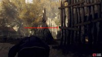 Sneak through the farm until you reach a large wooden fence.