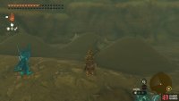 Find the babies tail in a sand pile across from Loone.