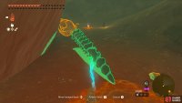 Use Ultrahand to move the tail next to the babies skull.