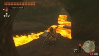 Use the hardened lava to navigate the river.