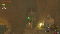 Head through this doorway next to the jail