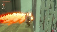 The second Construct has a shield with a stone slab that can be used to get past the flames.