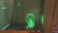 Place one of the spheres on the ramp there, so it rolls down to break that wall.