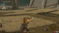 Then use a bomb flower or timed bomb to explode the rocks blocking the small passage in the ground!