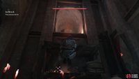 Look directly above the civilian on the floor to find the hidden passage.